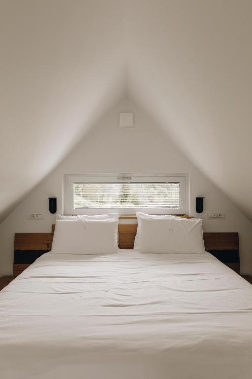 Postel nebo postele na pokoji v ubytování Nebesa Chalets