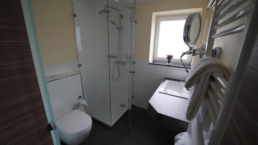 Koupelna v ubytování Hotel Zur Heide