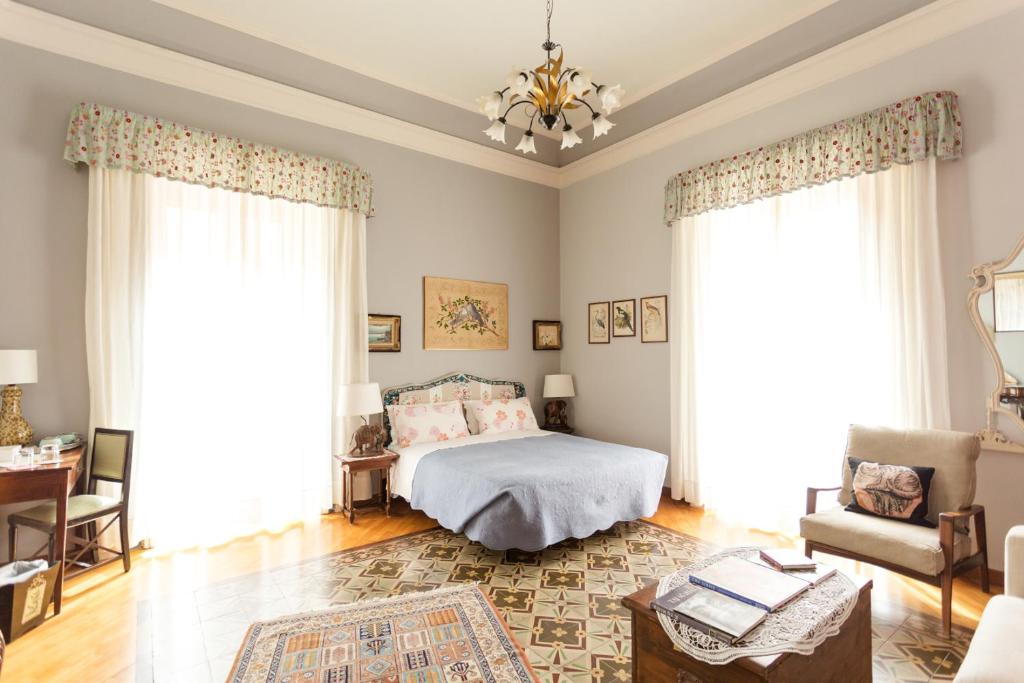 Posteľ alebo postele v izbe v ubytovaní Crociferi B&B