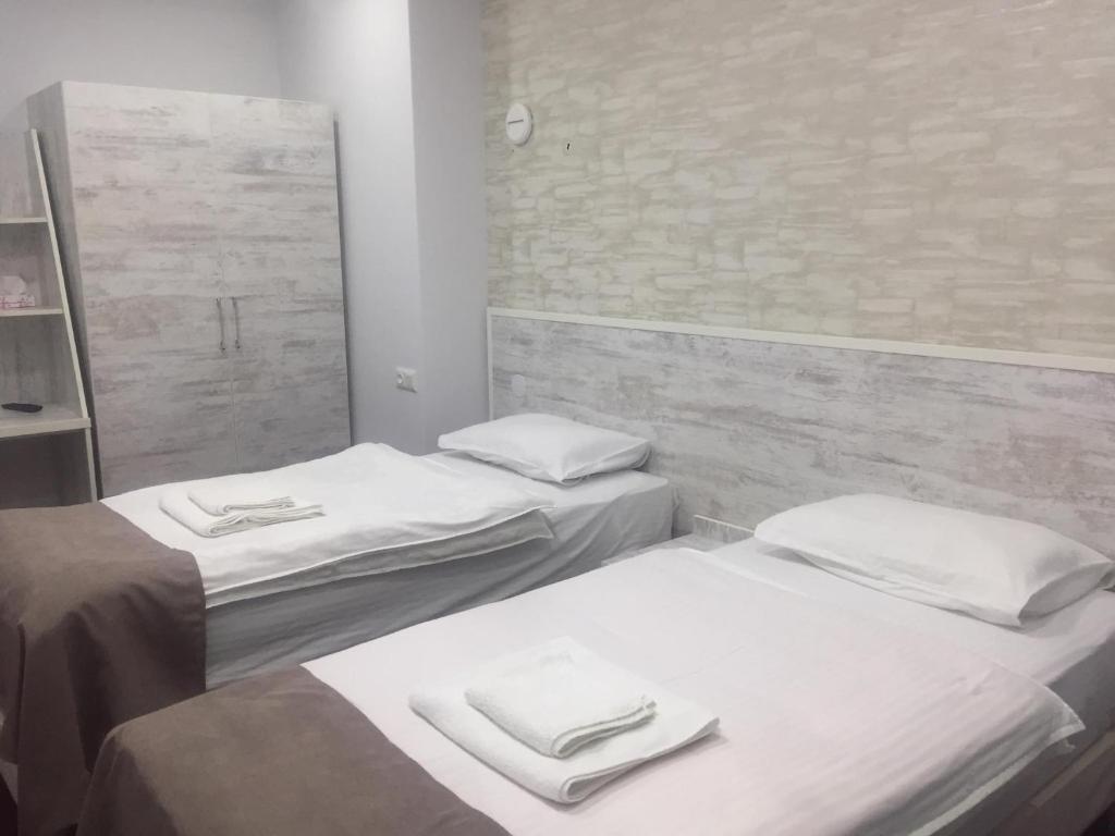 Postel nebo postele na pokoji v ubytování Hobby Hotel