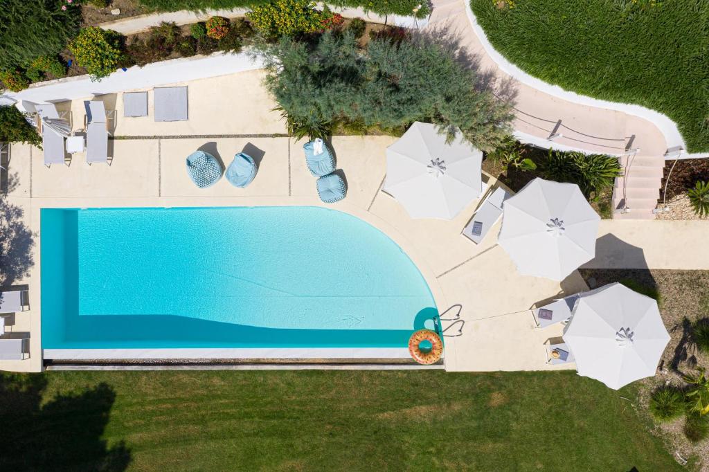 Bazén v ubytování Akti Elia Villas Beachfront Chalkidiki nebo v jeho okolí