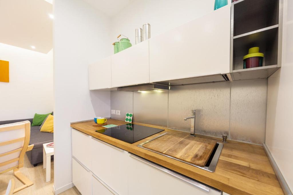 Kuchyňa alebo kuchynka v ubytovaní Mercato di Ortigia Apartments