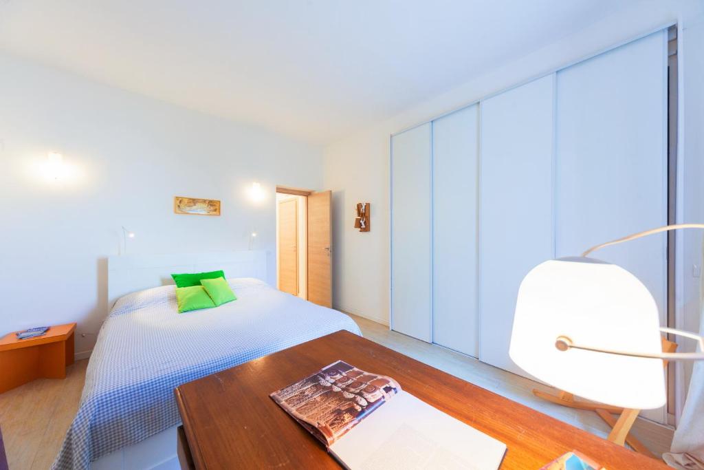 Posteľ alebo postele v izbe v ubytovaní Mercato di Ortigia Apartments