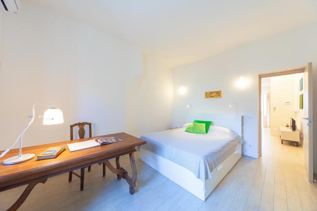 Posteľ alebo postele v izbe v ubytovaní Mercato di Ortigia Apartments