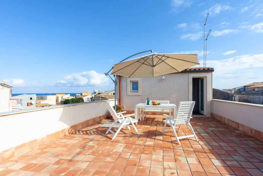 Balkón alebo terasa v ubytovaní Mercato di Ortigia Apartments