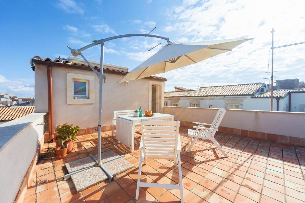 Balkón alebo terasa v ubytovaní Mercato di Ortigia Apartments