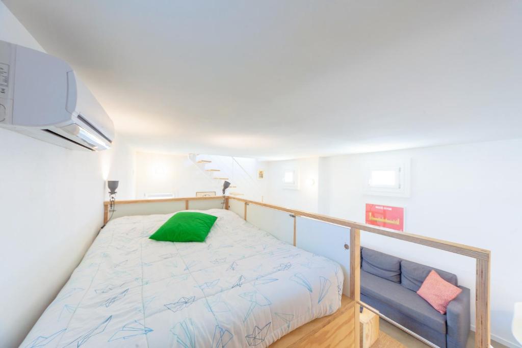 Posteľ alebo postele v izbe v ubytovaní Mercato di Ortigia Apartments