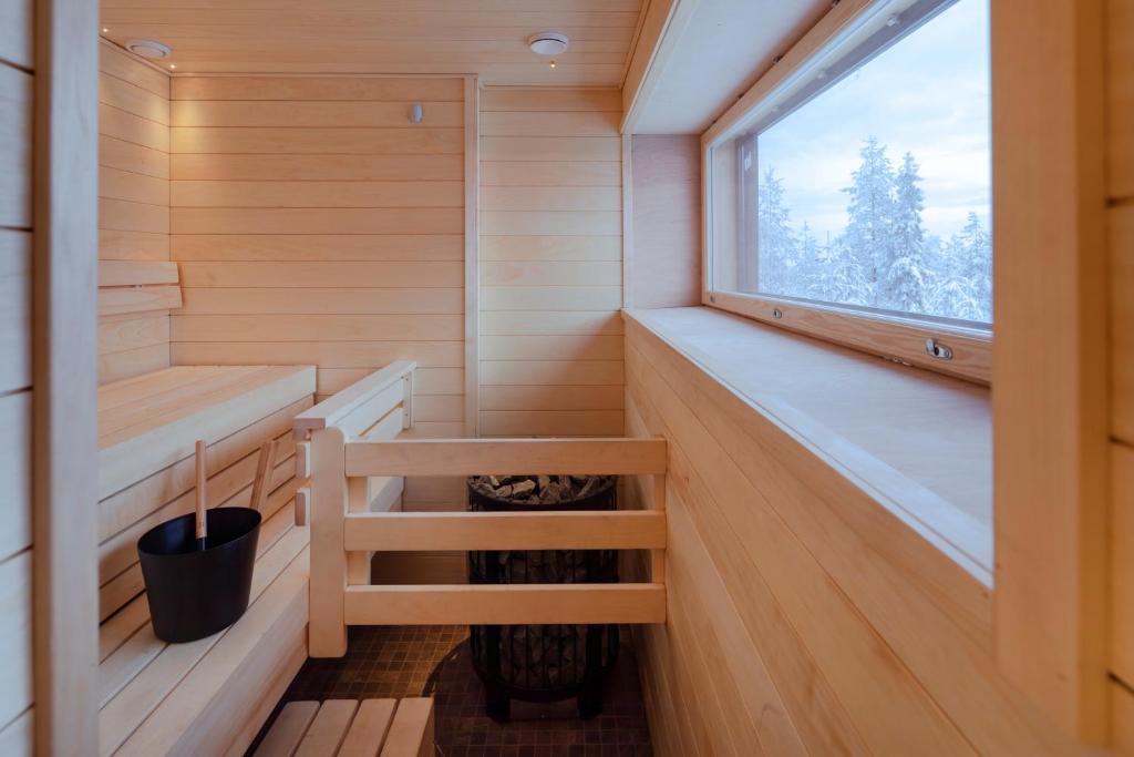 Palanda nebo palandy na pokoji v ubytování Lapland Hotels Sky Ounasvaara