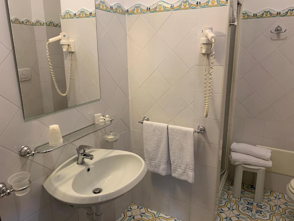 Koupelna v ubytování Hotel La Playa