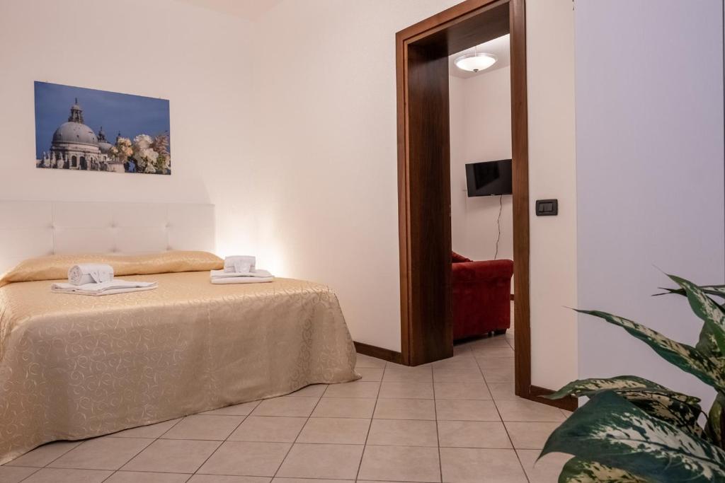 A bed or beds in a room at Sweet Venice - Exclusive near San Marco - WiFi