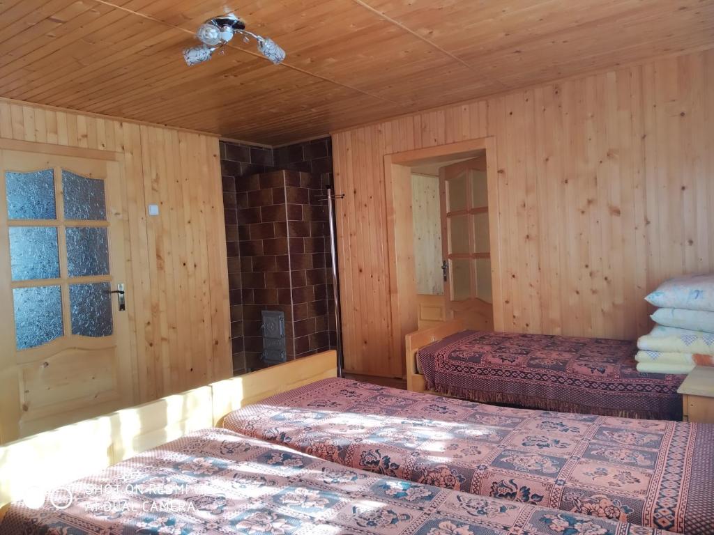 Postel nebo postele na pokoji v ubytování У ДЯДЬКА