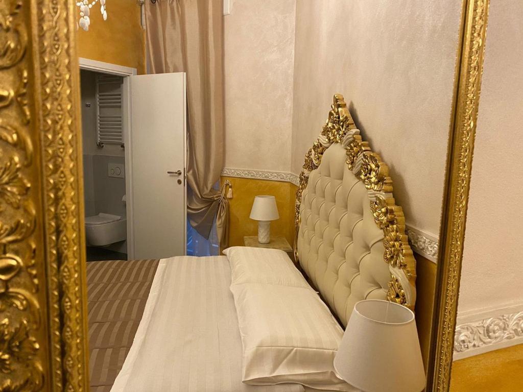 Postel nebo postele na pokoji v ubytování Residenza Elisabetta