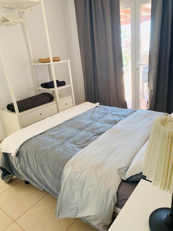Postel nebo postele na pokoji v ubytování Villa Tías