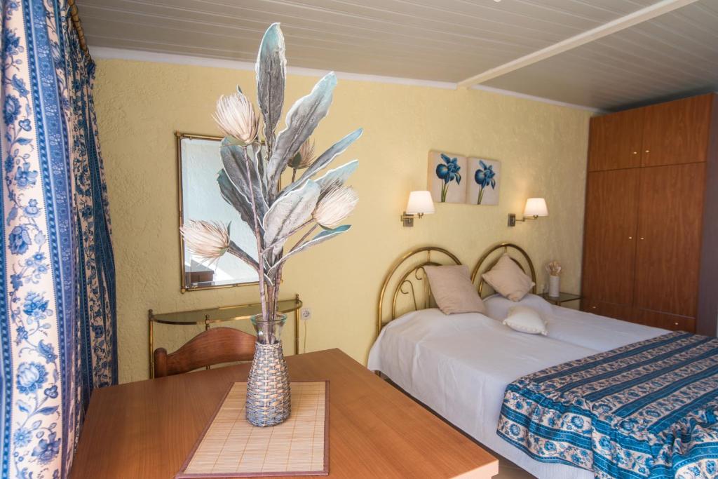 Posteľ alebo postele v izbe v ubytovaní Kommeno Bay Apartments