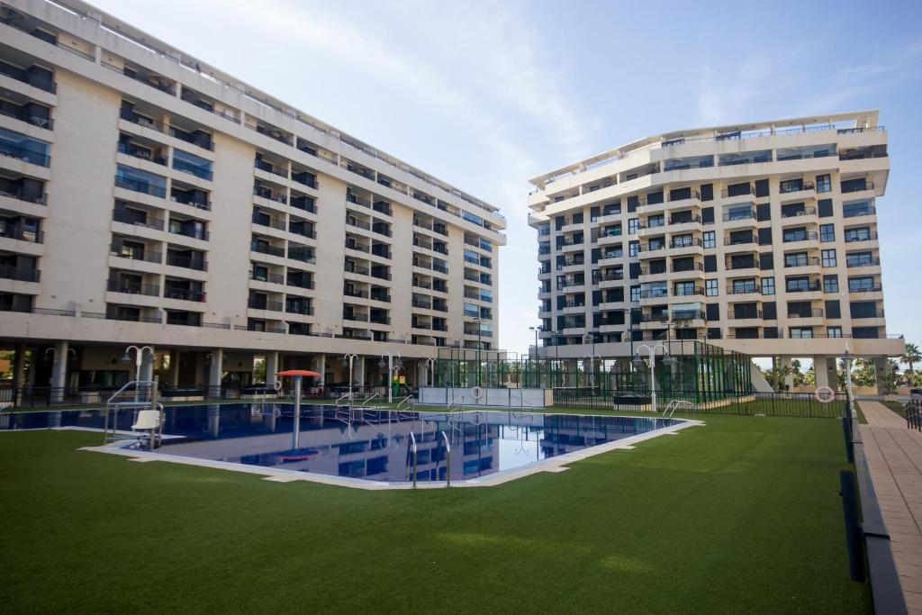 Bazén v ubytování Style Apartment Patacona Beach segunda linea nebo v jeho okolí