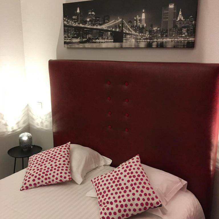 Postel nebo postele na pokoji v ubytování Hotel Dorele