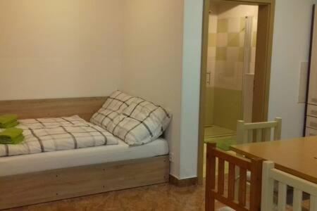 Posezení v ubytování Apartmán L M