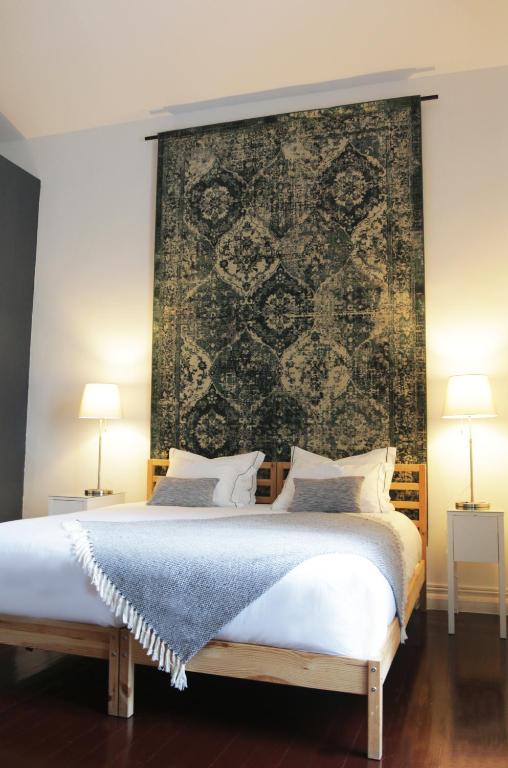 Postel nebo postele na pokoji v ubytování Procyon Boutique & Suites