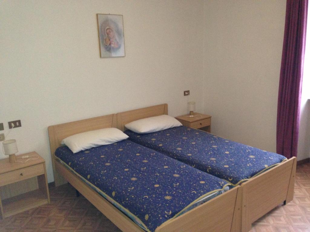 Postel nebo postele na pokoji v ubytování Villa dei Fiori