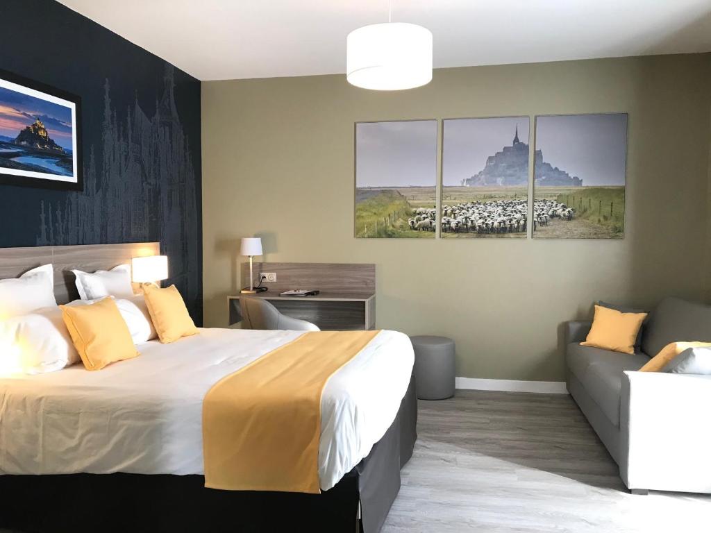 Postel nebo postele na pokoji v ubytování Hôtel Restaurant les 13 Assiettes