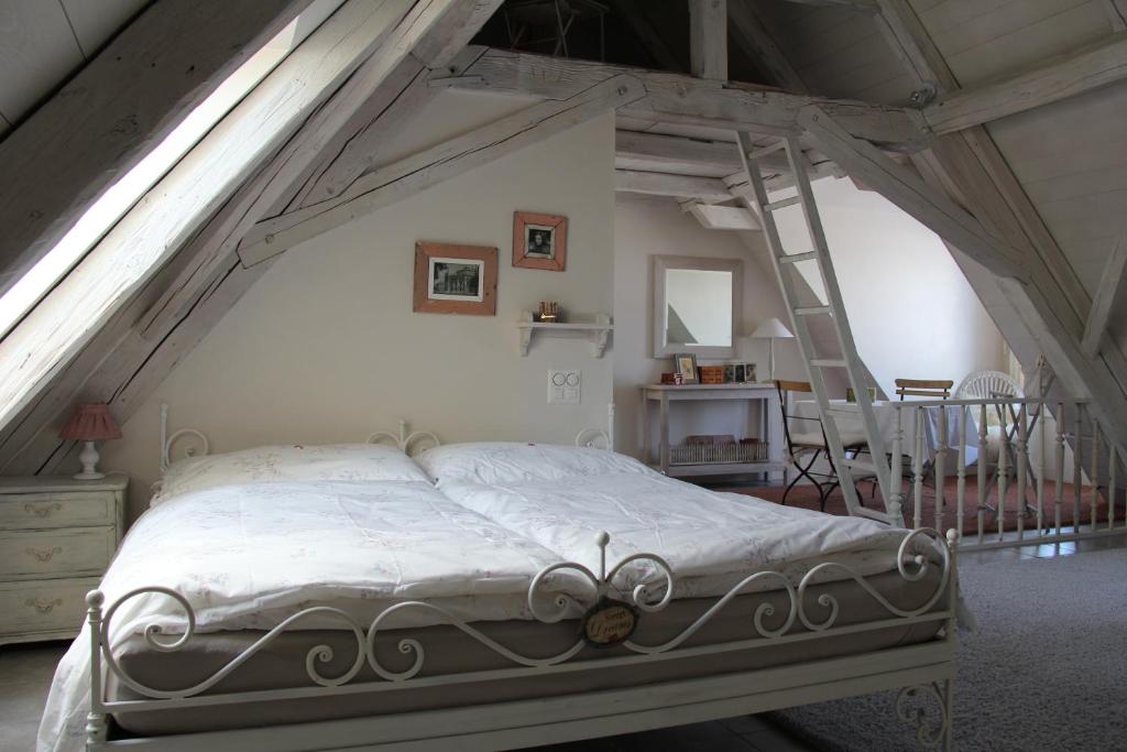 Ein Bett oder Betten in einem Zimmer der Unterkunft Bed and Breakfast Gantrisch Cottage Ferienzimmer