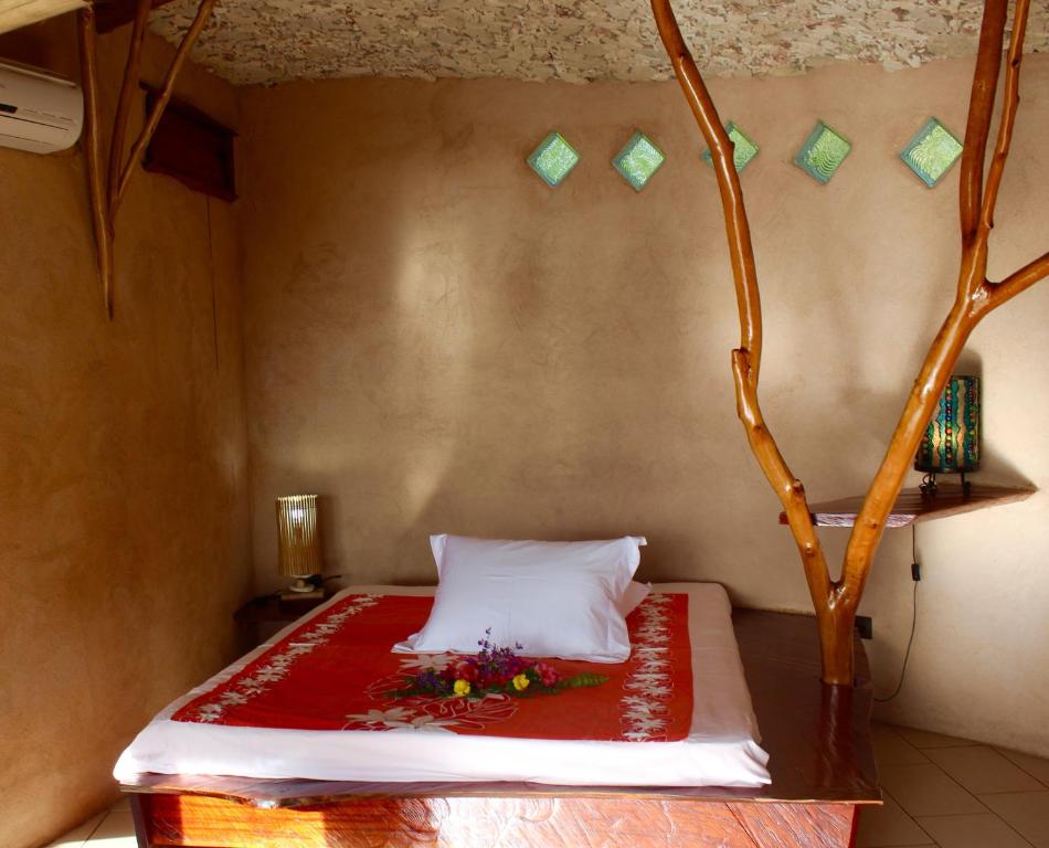 Postel nebo postele na pokoji v ubytování Vanira Lodge