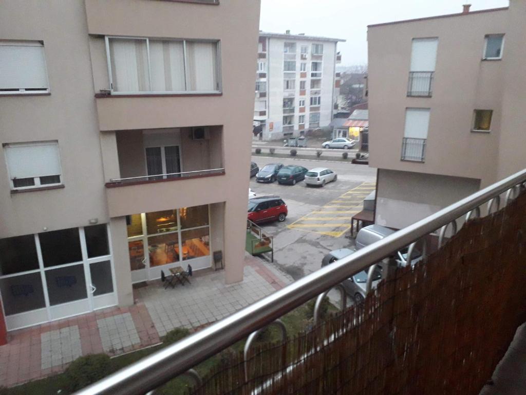 a view from a balcony of a parking lot at Apartman Katarina in Vranje