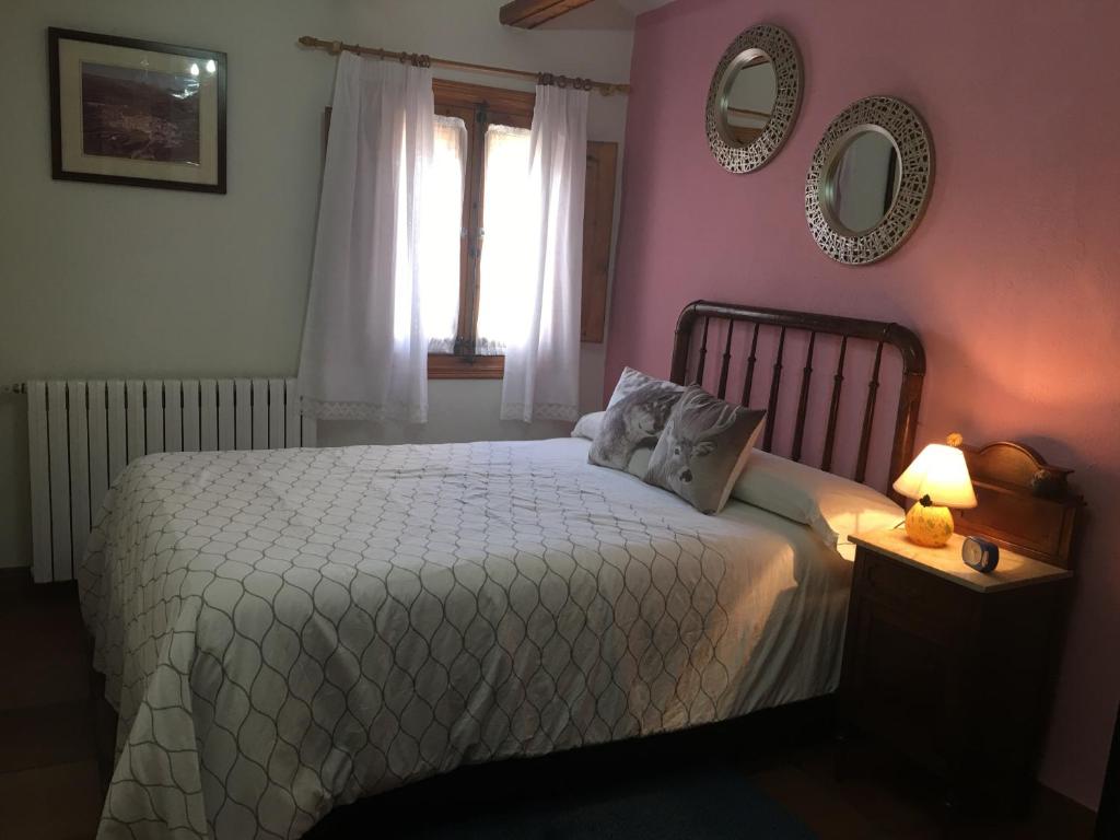 A bed or beds in a room at Casa Inés