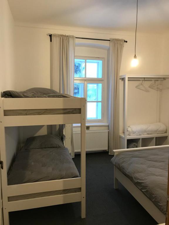 Postel nebo postele na pokoji v ubytování Stará Škola Hedeč