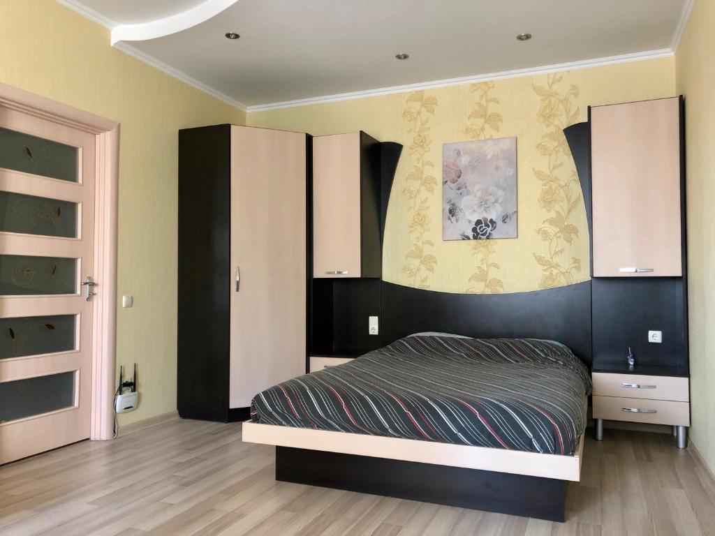 A bed or beds in a room at Apartment in the center