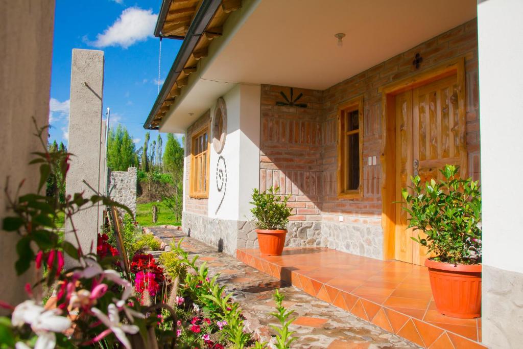 Zahrada ubytování Watzara Wasi Apart Hotel Vacacional en Cotacachi