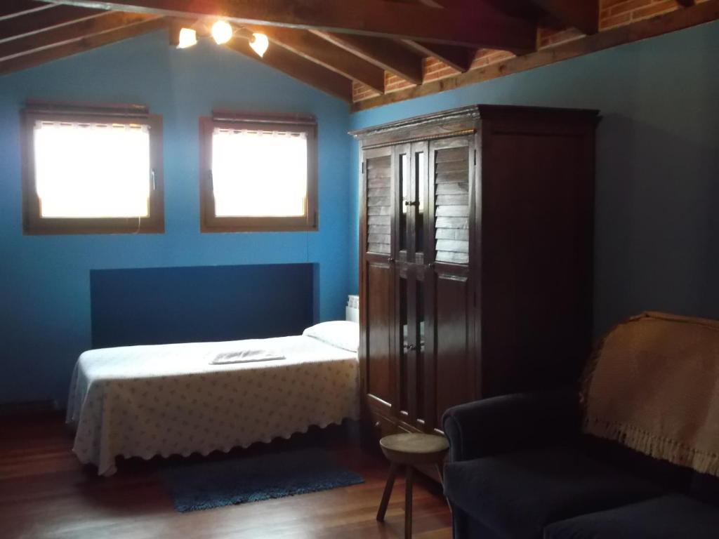A bed or beds in a room at Hotel Rural El Rincón de Gadea