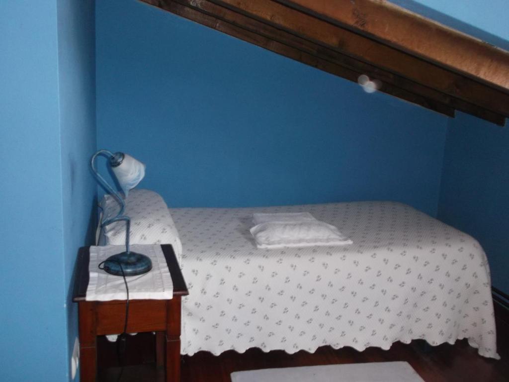 A bed or beds in a room at Hotel Rural El Rincón de Gadea