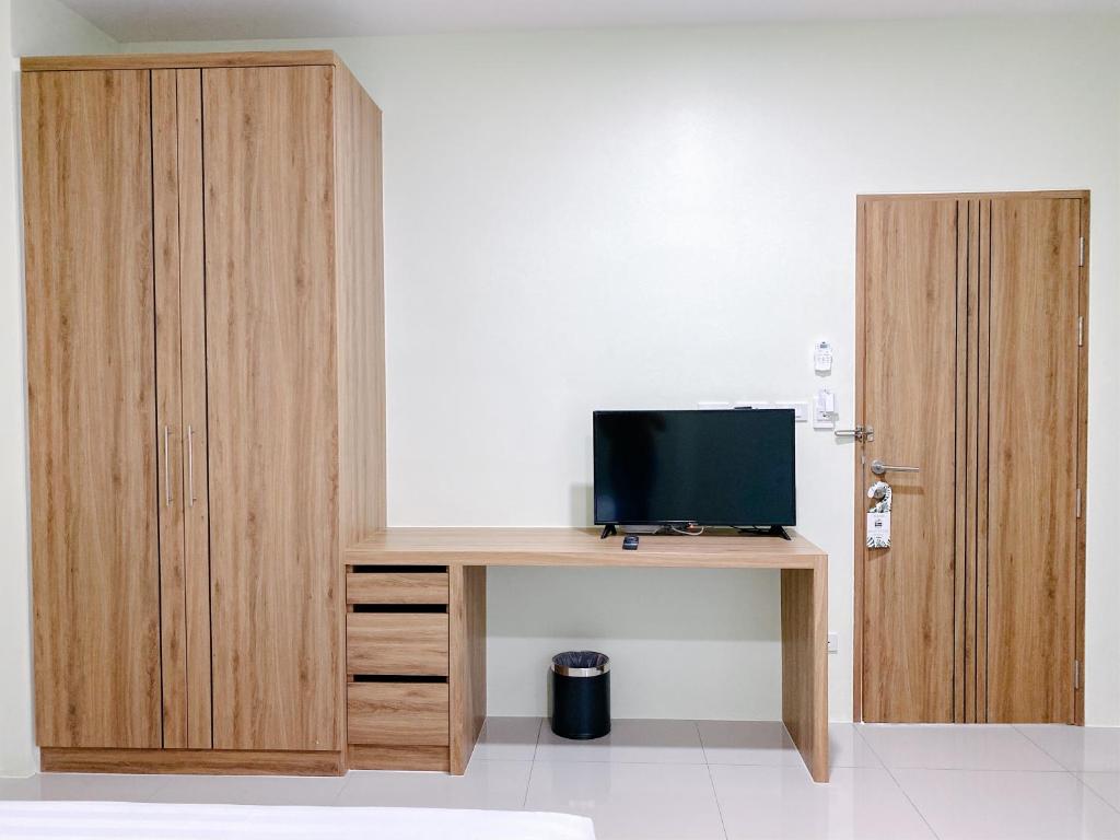 TV a/nebo společenská místnost v ubytování Nai Yang Residence