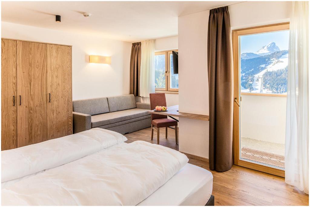 Postel nebo postele na pokoji v ubytování Garni B&B Chi Vai