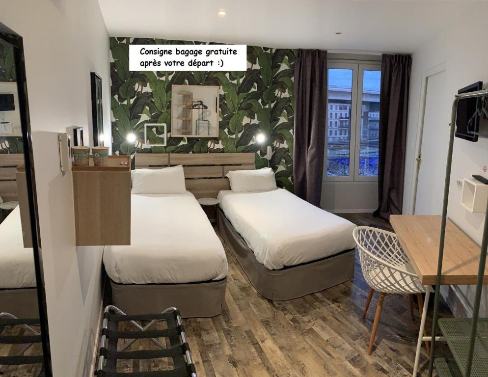 Postel nebo postele na pokoji v ubytování Hotel de Berne