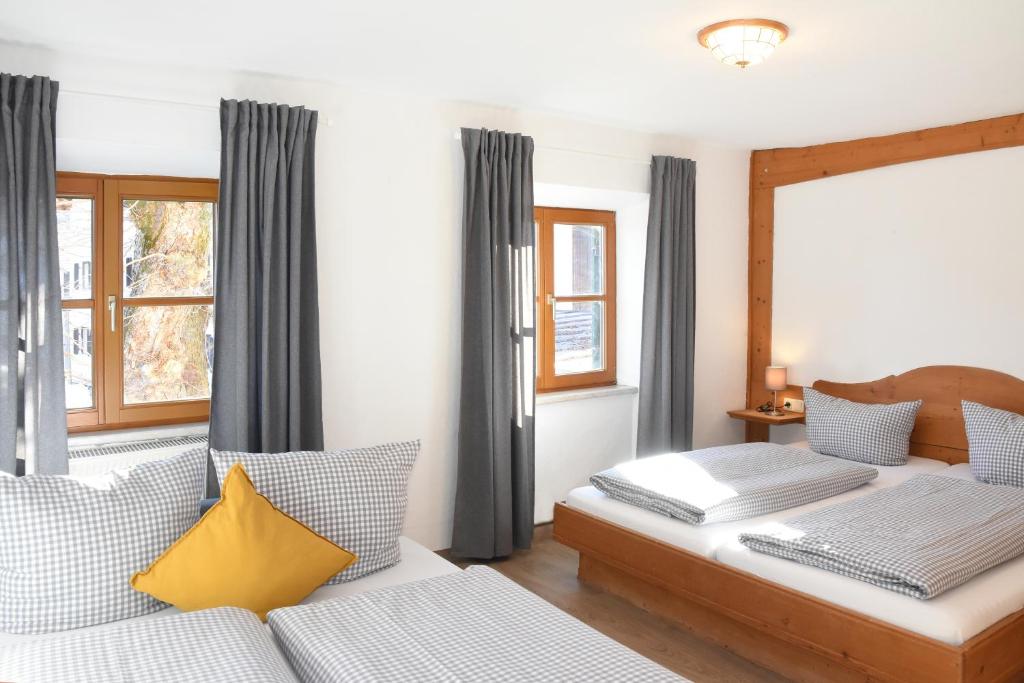 Postel nebo postele na pokoji v ubytování Alps Hostel