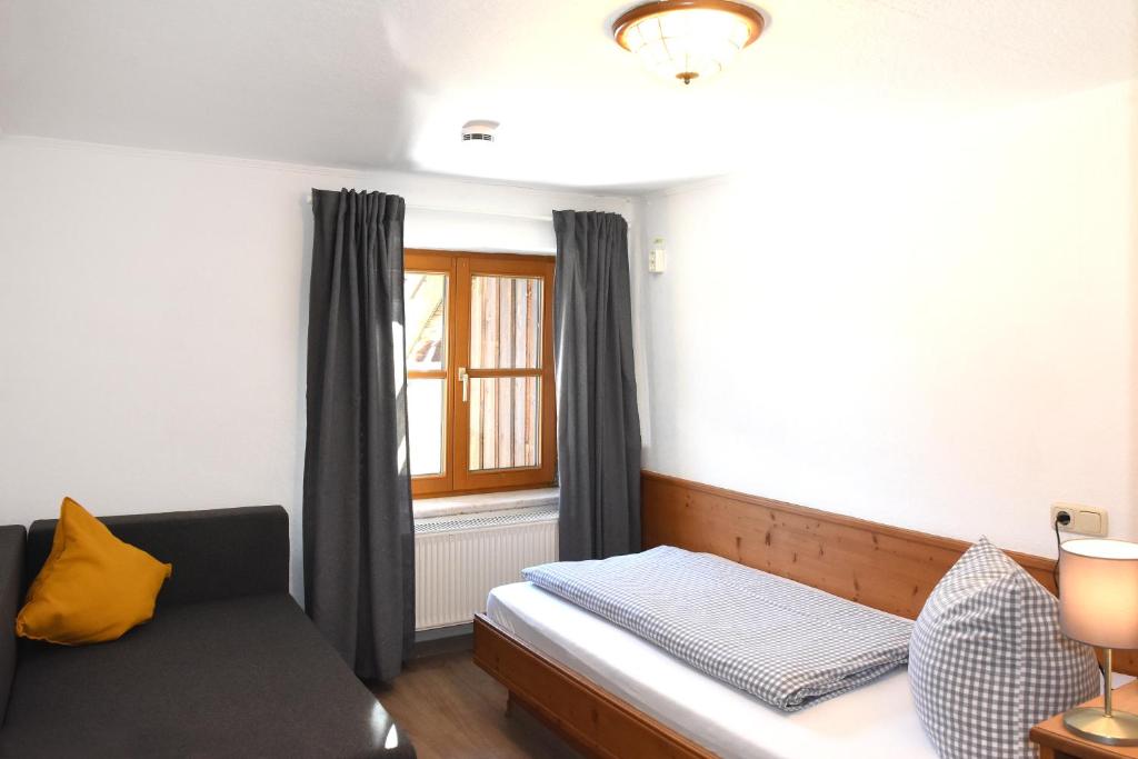 Postel nebo postele na pokoji v ubytování Alps Hostel