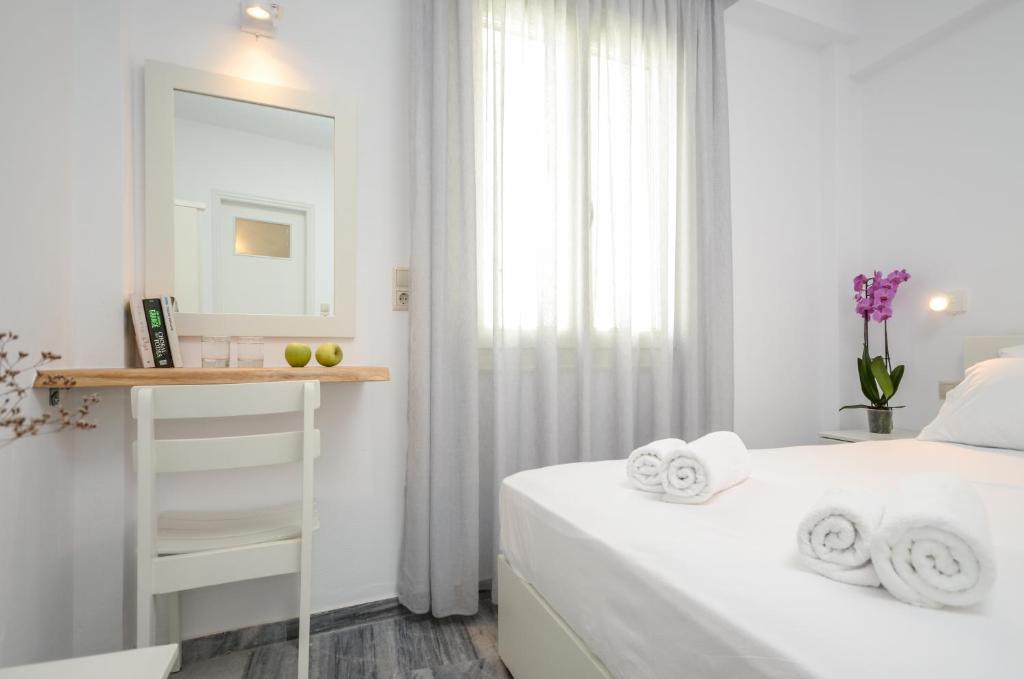 A bed or beds in a room at Soula Naxos