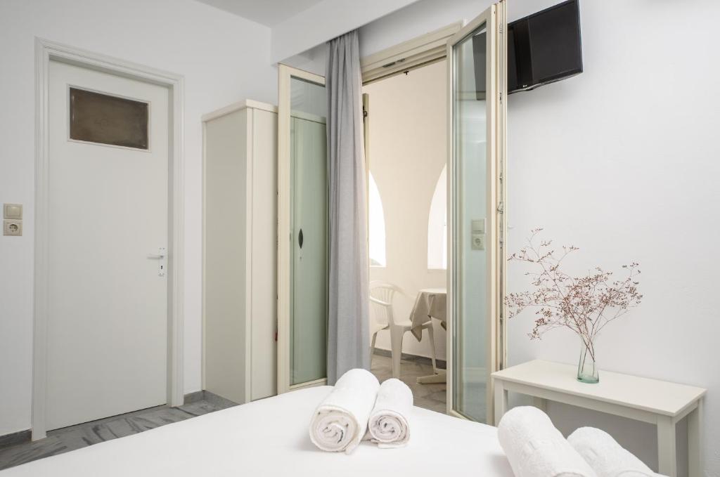 A bed or beds in a room at Soula Naxos