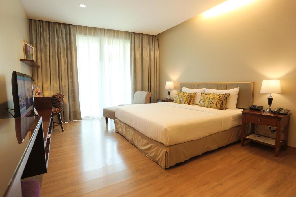 TV a/nebo společenská místnost v ubytování Le Patta Resort & Hotel Chiang Rai