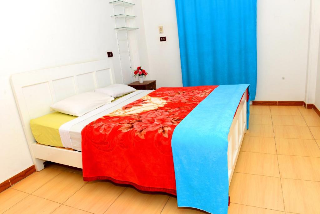 Postel nebo postele na pokoji v ubytování Luxor Guest House
