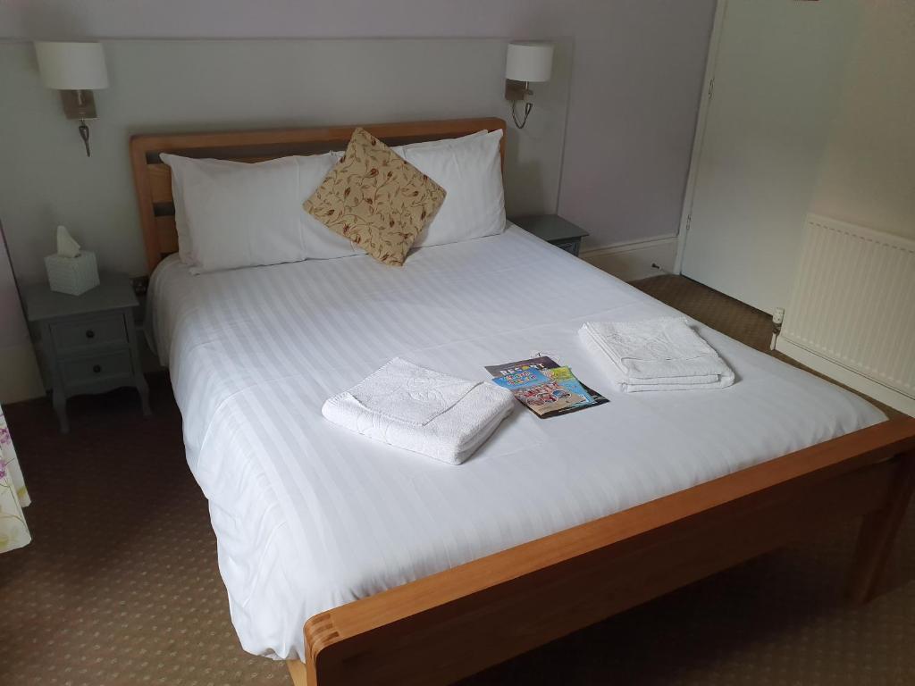 Cama o camas de una habitación en Alexandra Hotel