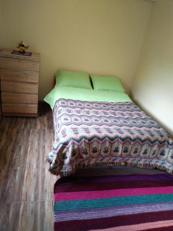 Voodi või voodid majutusasutuse Wayna Wasi toas