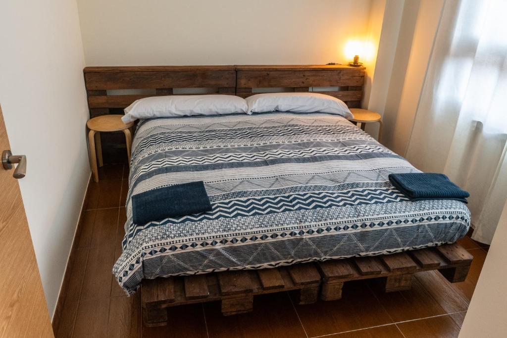 Postel nebo postele na pokoji v ubytování Albergue de Prioro
