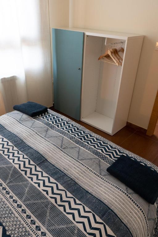 Postel nebo postele na pokoji v ubytování Albergue de Prioro
