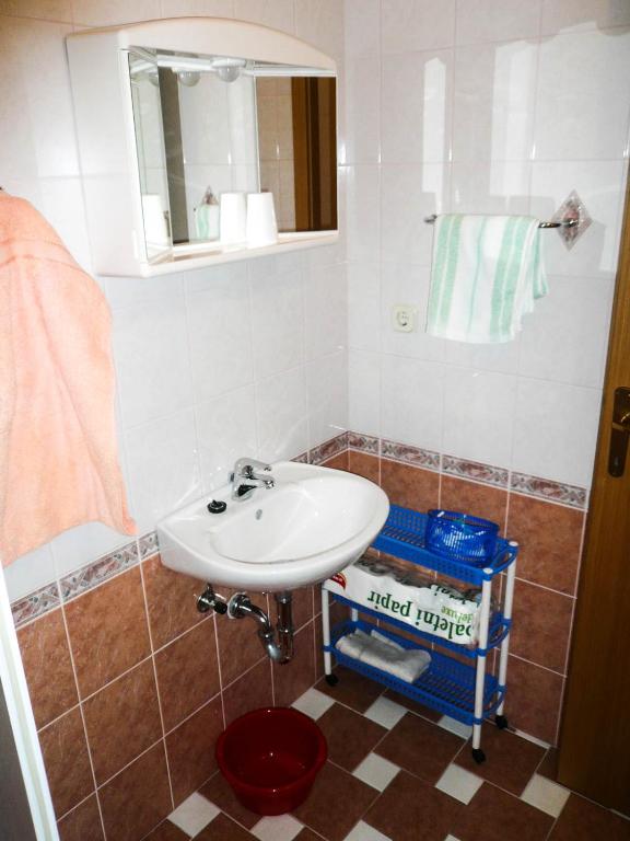Koupelna v ubytování Apartments Šarić