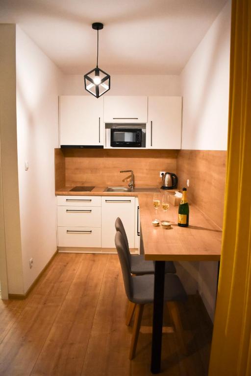 Kuchyň nebo kuchyňský kout v ubytování Apartmány Runi