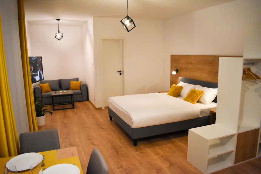 Postel nebo postele na pokoji v ubytování Apartmány Runi