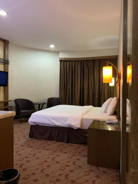 Postel nebo postele na pokoji v ubytování Sento Hotel